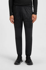 ACTIVE TRACKSUIT BOTTOMS IN GRAPHIC-PRINT PERFORMANCE FABRIC