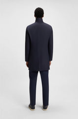 COAT WITH CONCEALED CLOSURE